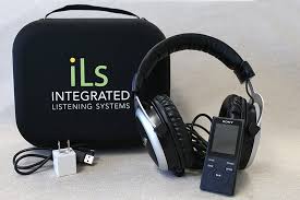 iLs Equipment auditory training mph3 player leaning against headphones and a CD case
