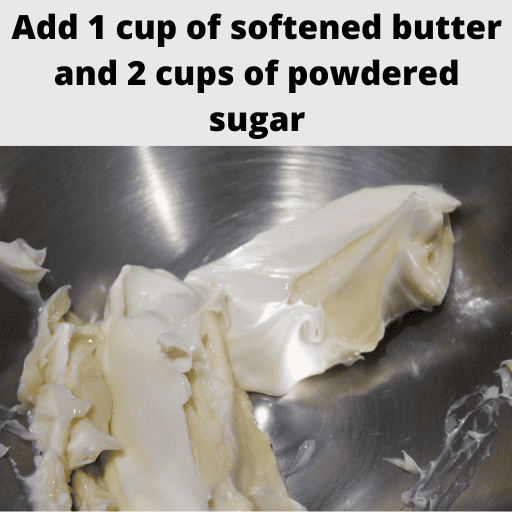 two sticks of dairy free butter in a stainless steal mixing bowl. 