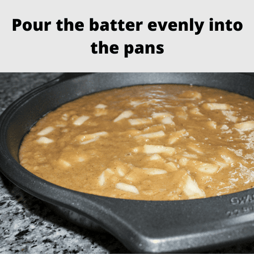 Apple spice cake in a baking pan ready for the oven.