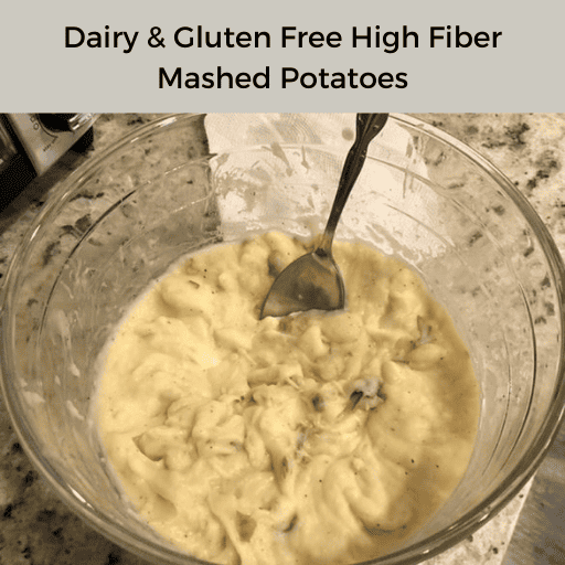 glass bowl with high fiber mashed potatoes and a metal serving spoon