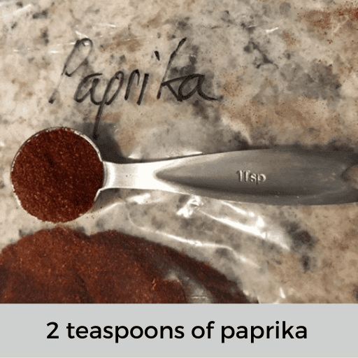 metal teaspoon of paprika