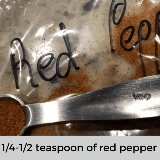 metal half teaspoon of red pepper
