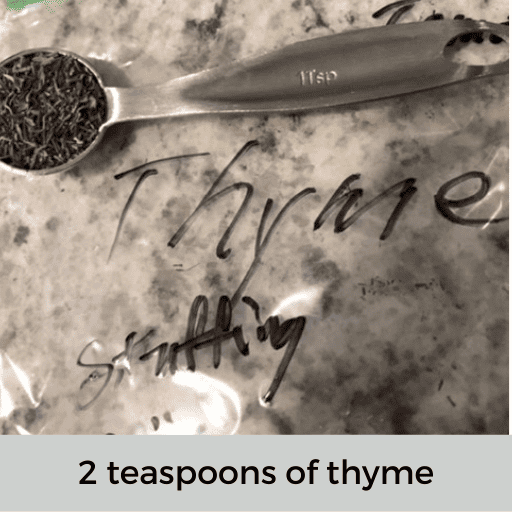 metal teaspoon of thyme