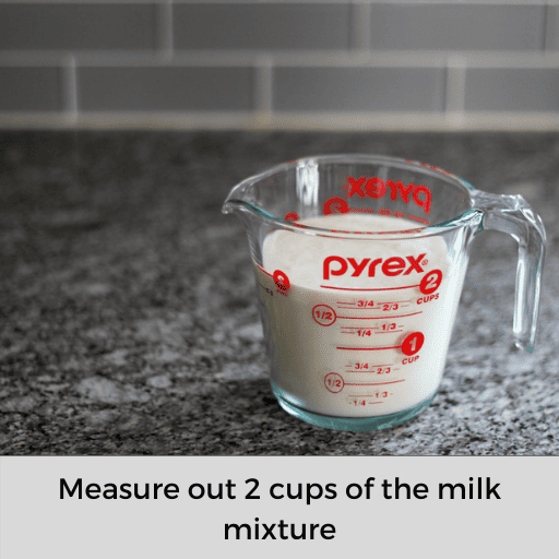 2 cups of milk mixture in a glass measuring cup on the countertop 