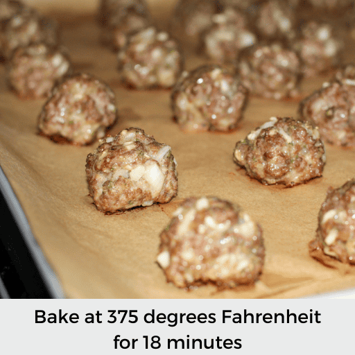 Baked gluten and dairy free meatballs on a baking sheet