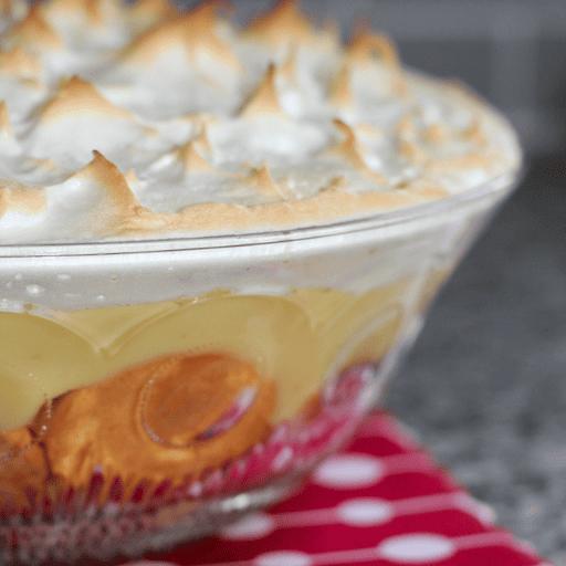 Gluten and dairy free banana pudding in a crystal dish with browned meringue