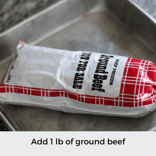 packaged of ground beef in a square baking pan