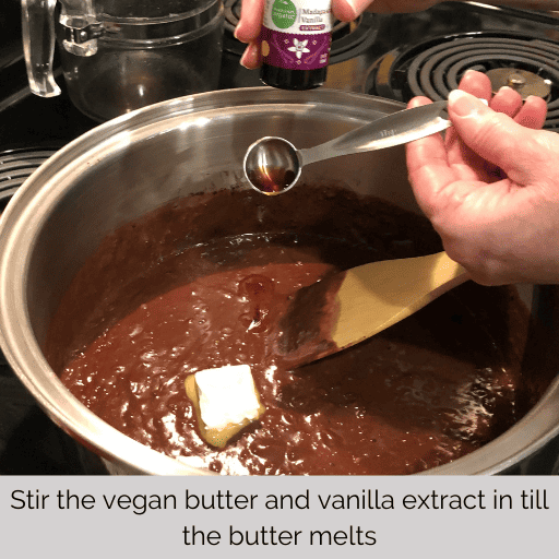 Adding butter and vanilla to the chocolate pudding in the saucepan