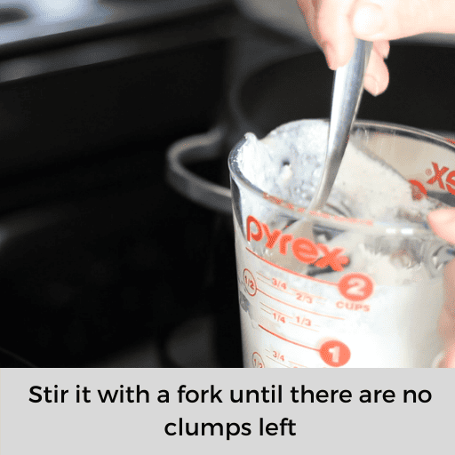 stirring cornstarch and milk together in a glass measuring cup