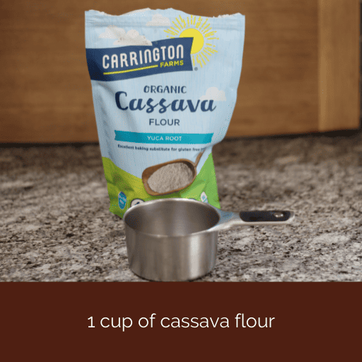 bag of cassava flour with a one cup measuring cup sitting in front of it. 