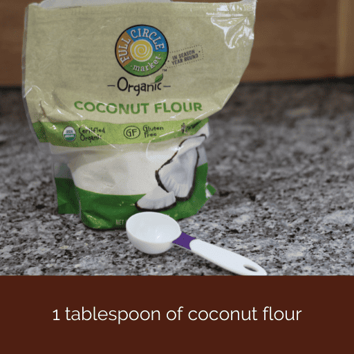 bag of coconut flour with a tablespoon sitting in front of it. 