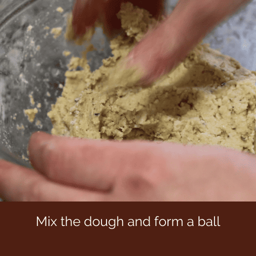 handing kneading gluten and dairy free pizza crust dough. 