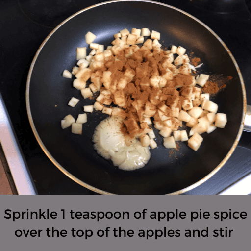 diced apples with seasoning and butter in a skillet