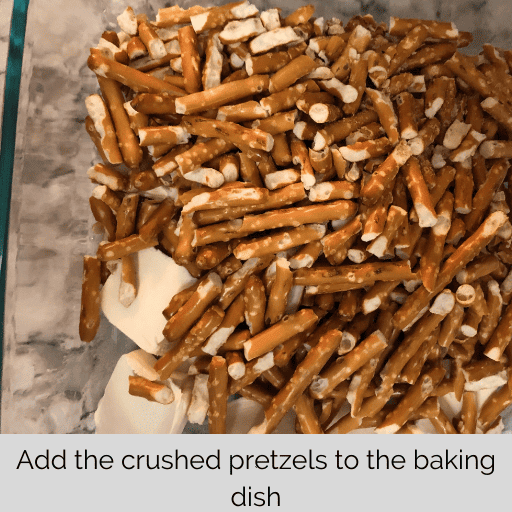 pretzels and butter in a glass baking dish