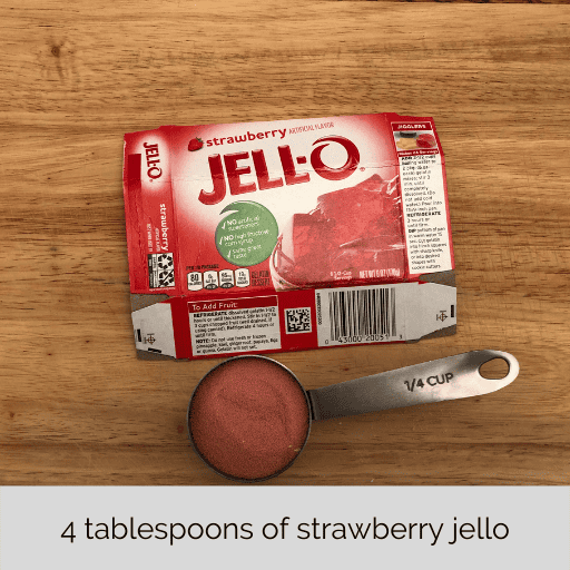 tablespoon of jello with the jello box laid flat above it