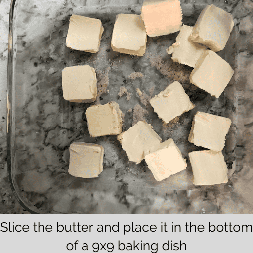 sliced butter in the bottom of a glass 9x9 baking dish