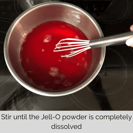 stirring the jell-o with a small whisk