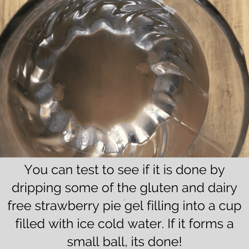 glass of water with droplets of the gel in it