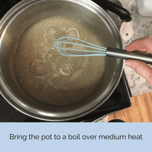 whisking the sweetened condensed milk on the stovetop as it simmers