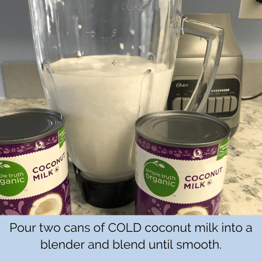 two cans of coconut milk sitting on the counter in front of a blender filled with coconut milk