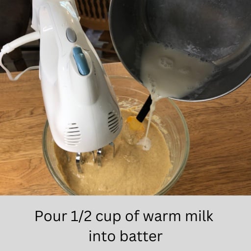 Pour warm milk into pancake batter