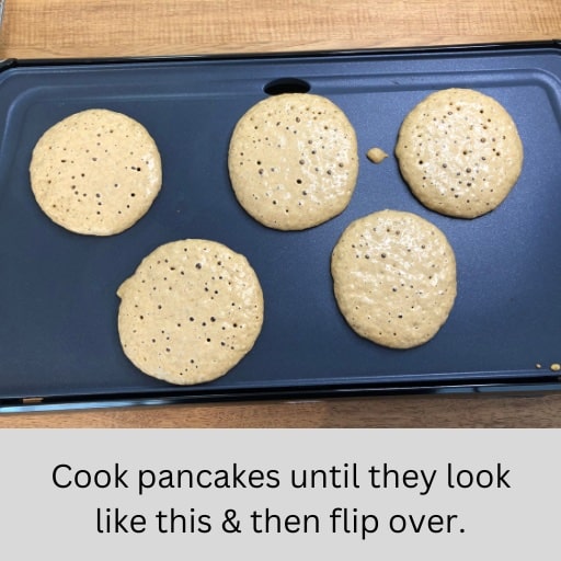 Flip over pancakes once you see lots of air holes.