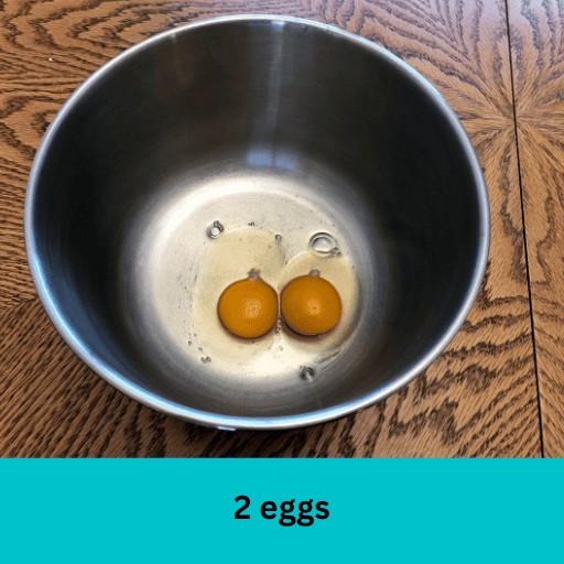 2 eggs in a metal bowl